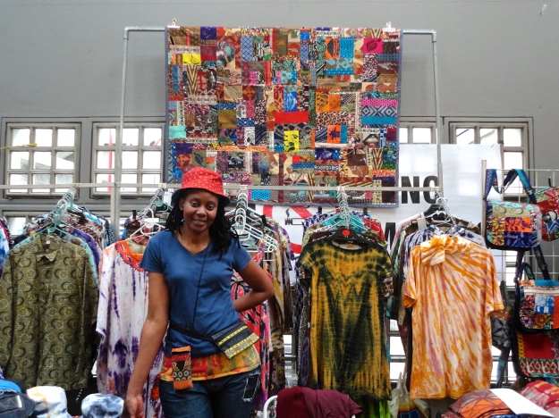 Namukolo Mukutu, one of my favorite artists at the Rosebank Rooftop Sunday Market (on top of a shopping mall;what a great idea!). She does custom made clothing and accessories. Both Karen & I could not resist...