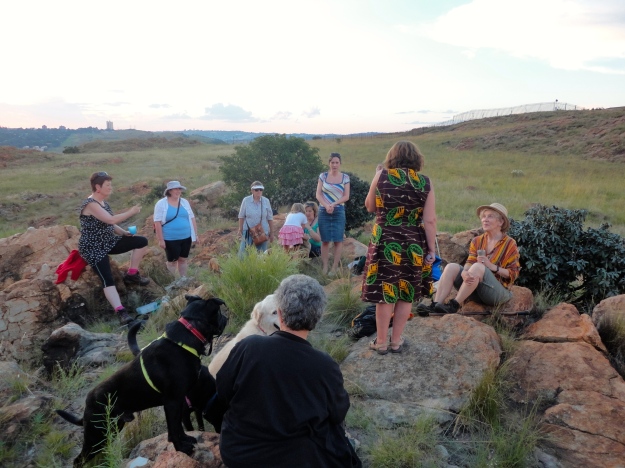A sundowner on the Koppies with friends, canines, shared wine and munchies.