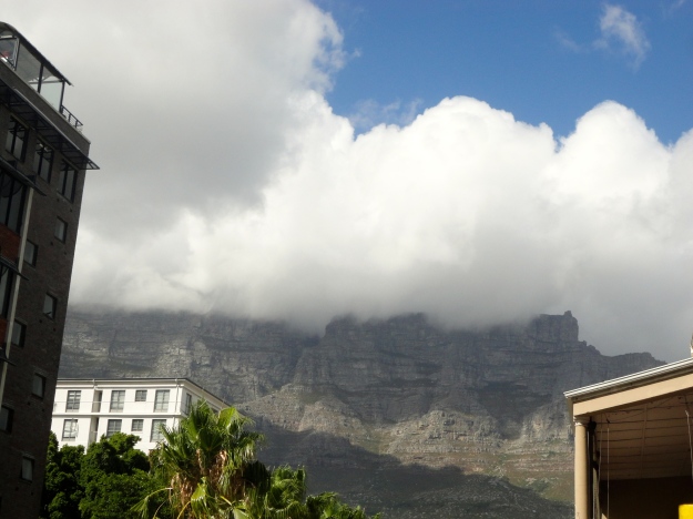 Clouds rolling in over Table Mountain. This is known as the tablecloth.