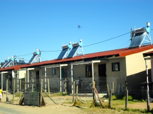 There is slow progress, but most townships are improving conditions. Solar h/w tanks, Langa